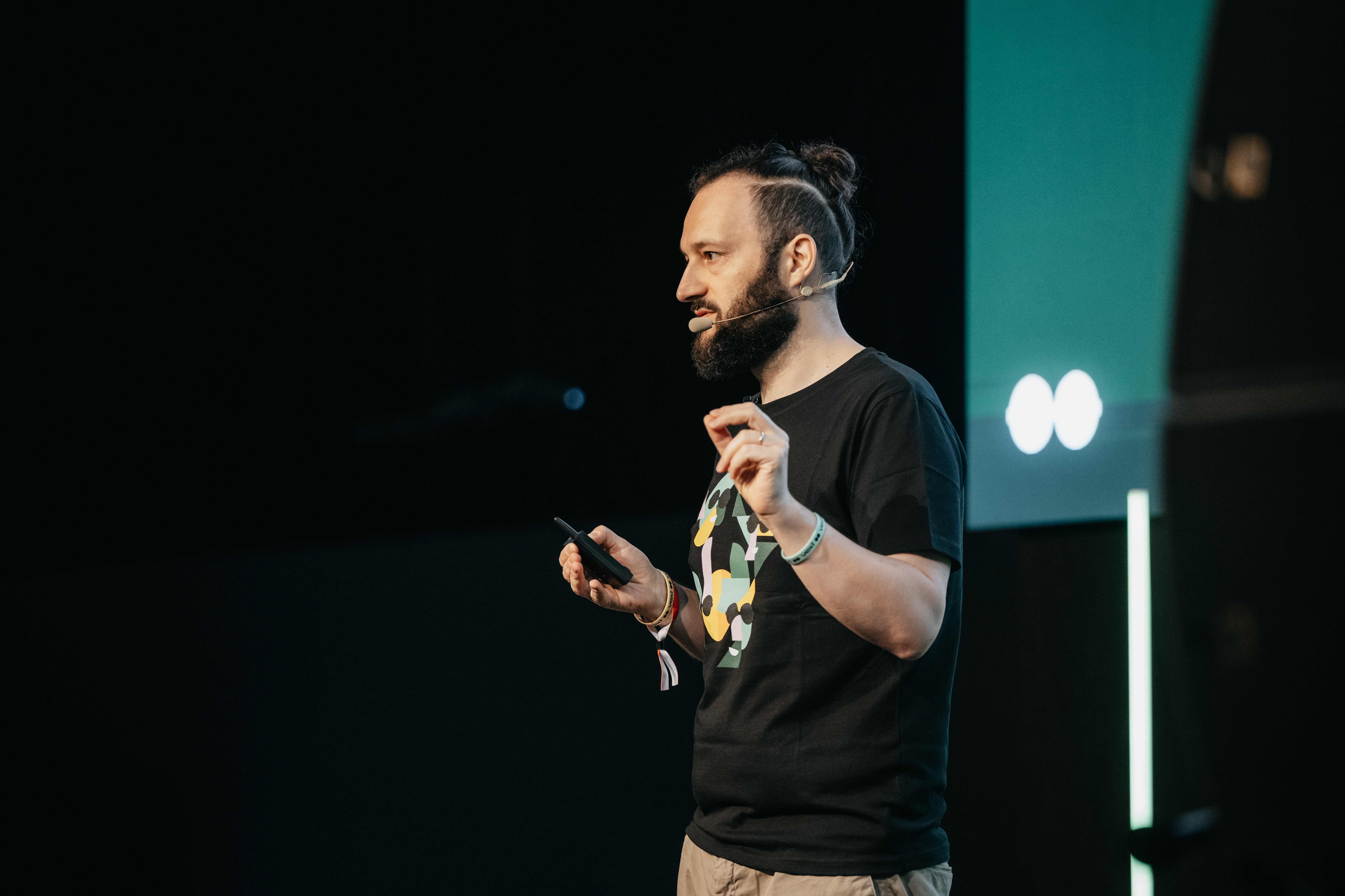 Marco Giorgetti speaking on stage at BTC Prague conference